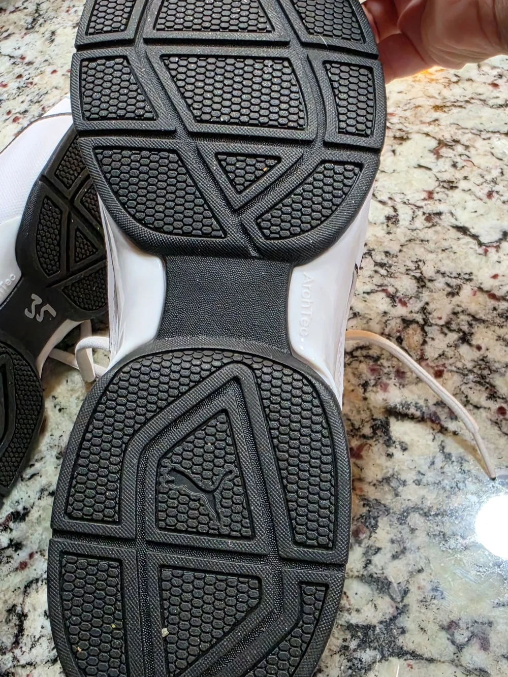 Puma Men's White Sneakers with Black Accent